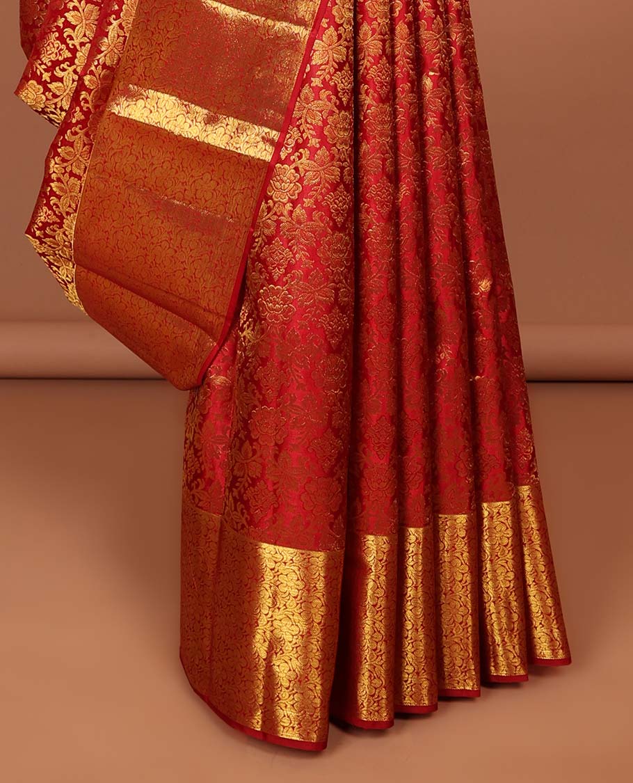 Red floral jacquard kancheepuram silk with self floral border & pallu of argyle pattern