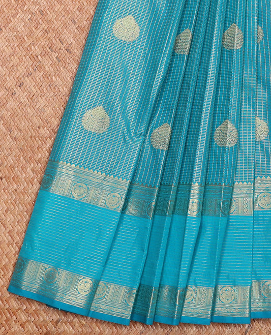 Blue Budget Silk Saree Richly Detailed with Zari Buttas and Micro-Checks, Embellished with a Traditional Zari-Motif Stepped Border, Complemented by a Contrast Jaal-Designed Pallu, and Paired with a Contrast Blouse