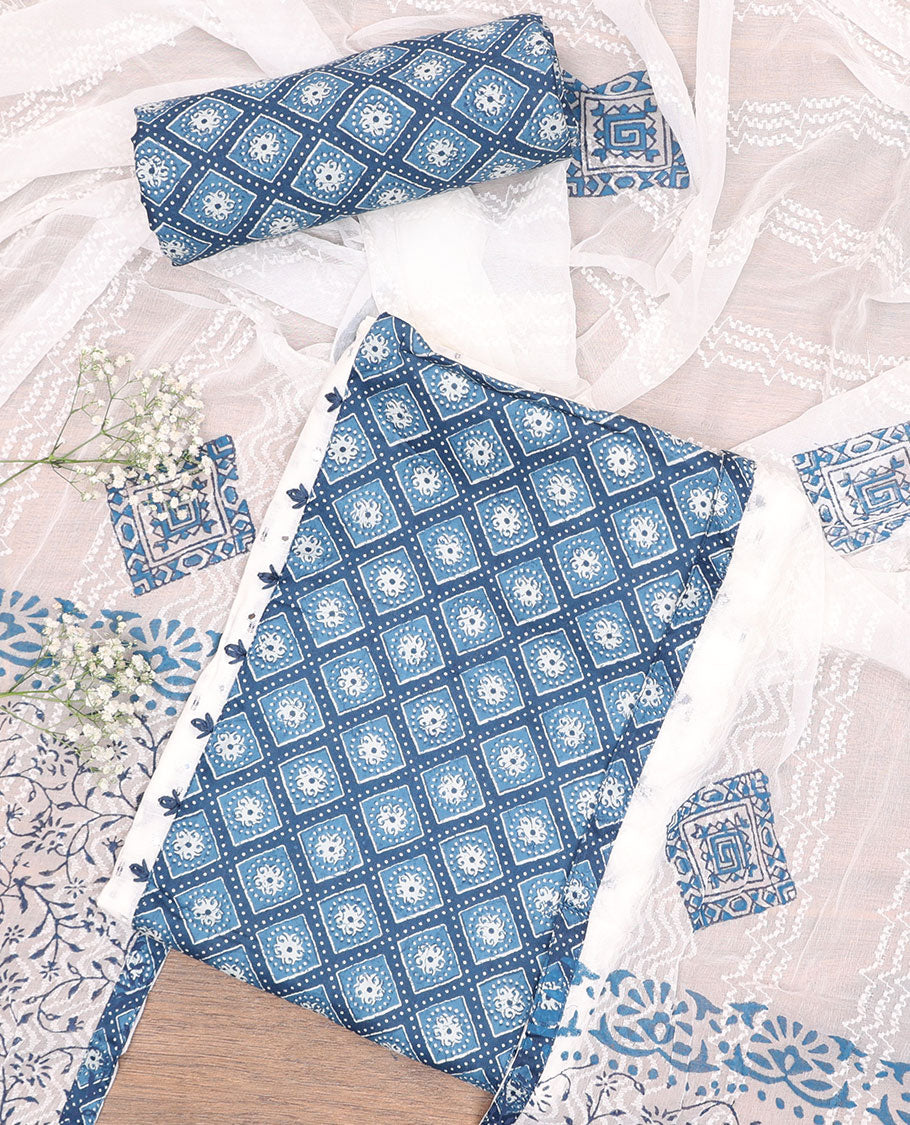 White cotton chudidhar material set,dobby-style buttas & neckwork top, printed bottom & thread work & printed dupatta