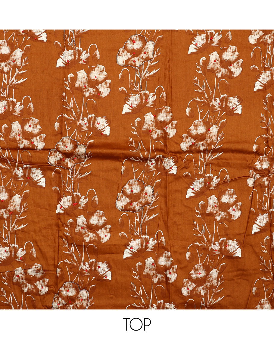 Orange material chudidar set, floral printed with French knot embroidered top, plain bottom, and dupatta of stripes and floral print