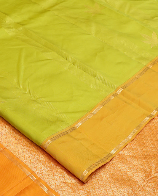 Parrot green zari design Vasundhara silk mix saree, contrast rettai pettu border of muthu designs, and jaal pallu
