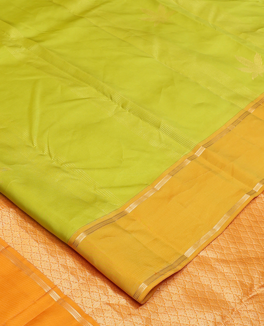Parrot green zari design Vasundhara silk mix saree, contrast rettai pettu border of muthu designs, and jaal pallu