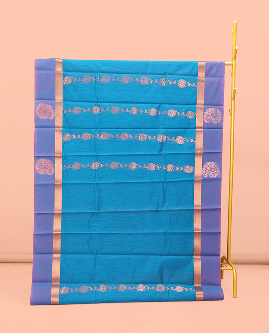 Blue Semi-Silk Cotton Saree, Artfully Adorned with Floral Creeper Design All Over Its Body, Complemented by a Contrast Paisley Zari Design Border, Pallu of Paisley Design, and Paired with a Matching Blouse