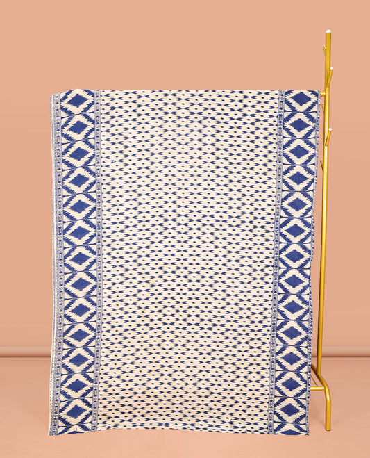 Blue and Off-White Machine-Printed Kalamkari Cotton Saree, Steeped with Buttas on Its Body, Subtle Ikkat Geometric Printed Border, Pallu of Peacock Print, and Paired with a Printed Blouse