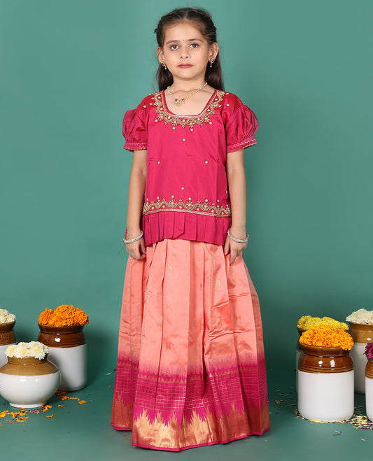 Peach readymade art silk pavadai, zari buttas & contrast traditional border skirt, & embroidered puff-sleeve round-neck blouse