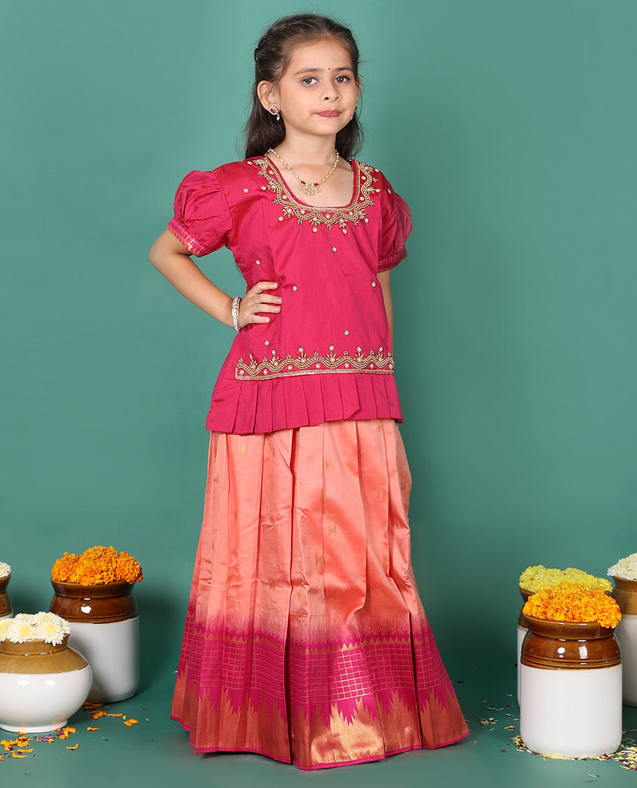 Peach readymade art silk pavadai, zari buttas & contrast traditional border skirt, & embroidered puff-sleeve round-neck blouse
