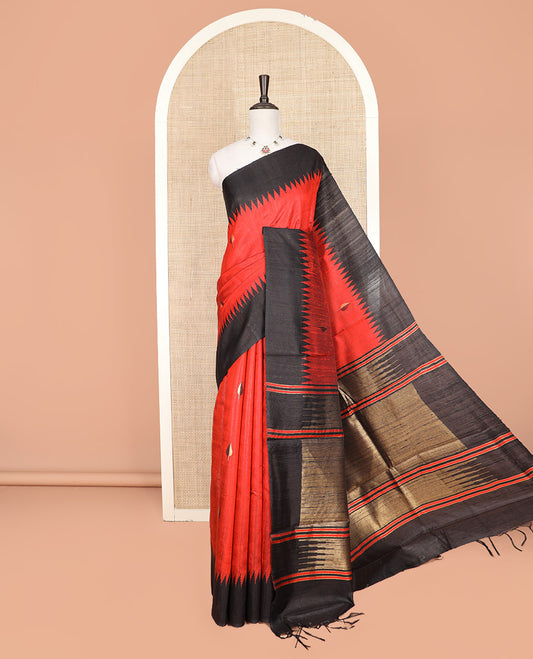 Red Dupion Silk Saree, Sparsely Sparkled with Buttas All Over Its Body, Captivating Contrast Temple Border, Zari-Woven Pallu, and Paired with a Contrast Blouse