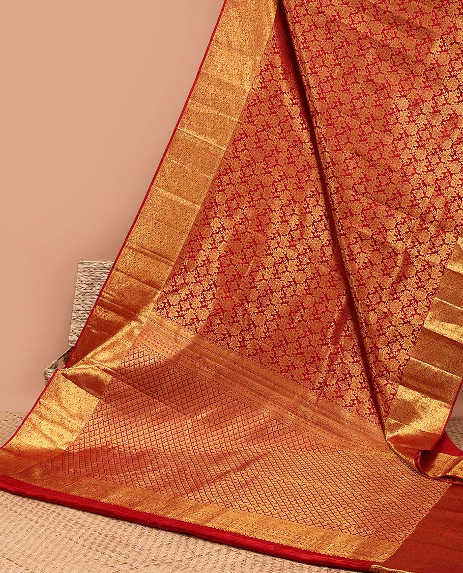 Red floral jacquard kancheepuram silk with self floral border & pallu of argyle pattern