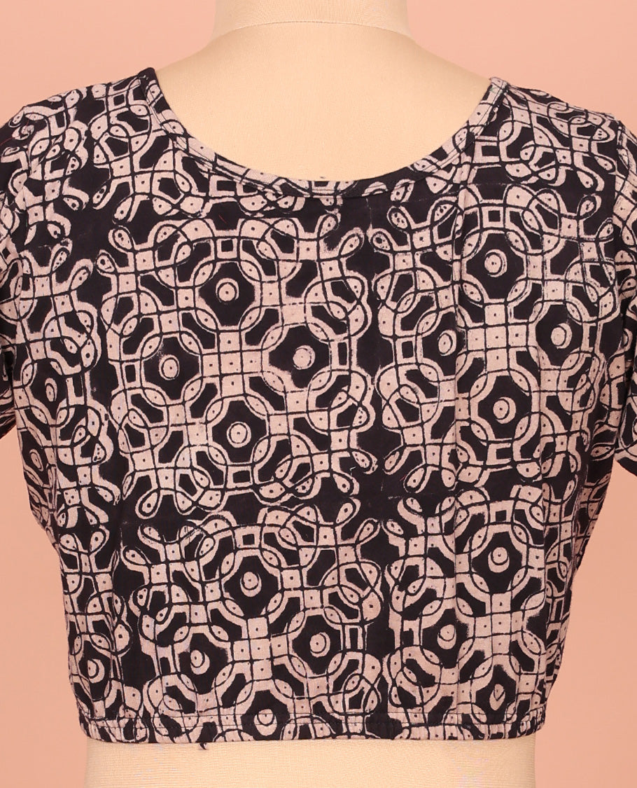 Black Cotton Readymade Blouse Subtly Sparked with All-Over Kolam Motifs Print, Featuring a Front Round-Neck, a Closed Back Neck, and Elbow Sleeves