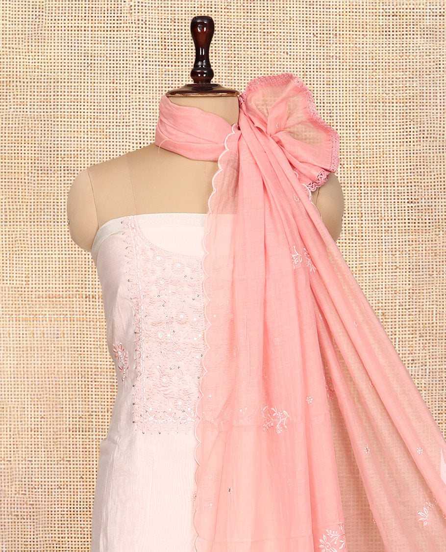 Cream-Peach Mul Chanderi Material Churidar Features Thread-Sequins Embroidered Top, a Contrast Bottom, Scallop Embroidered Dupatta