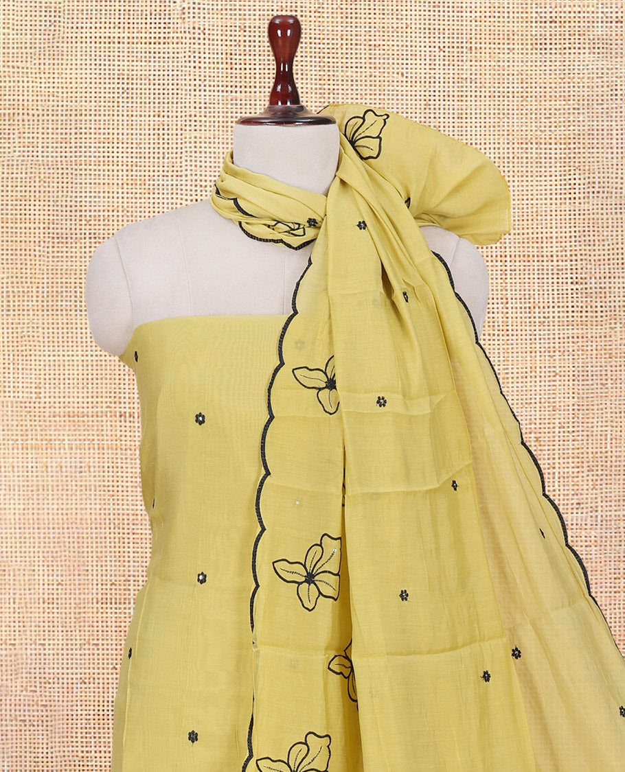 Lemon Yellow Mul Chanderi Material Churidar Features Floral Thread Embroidered Top, a Matching Bottom, and an Scallop Embroidered Dupatta