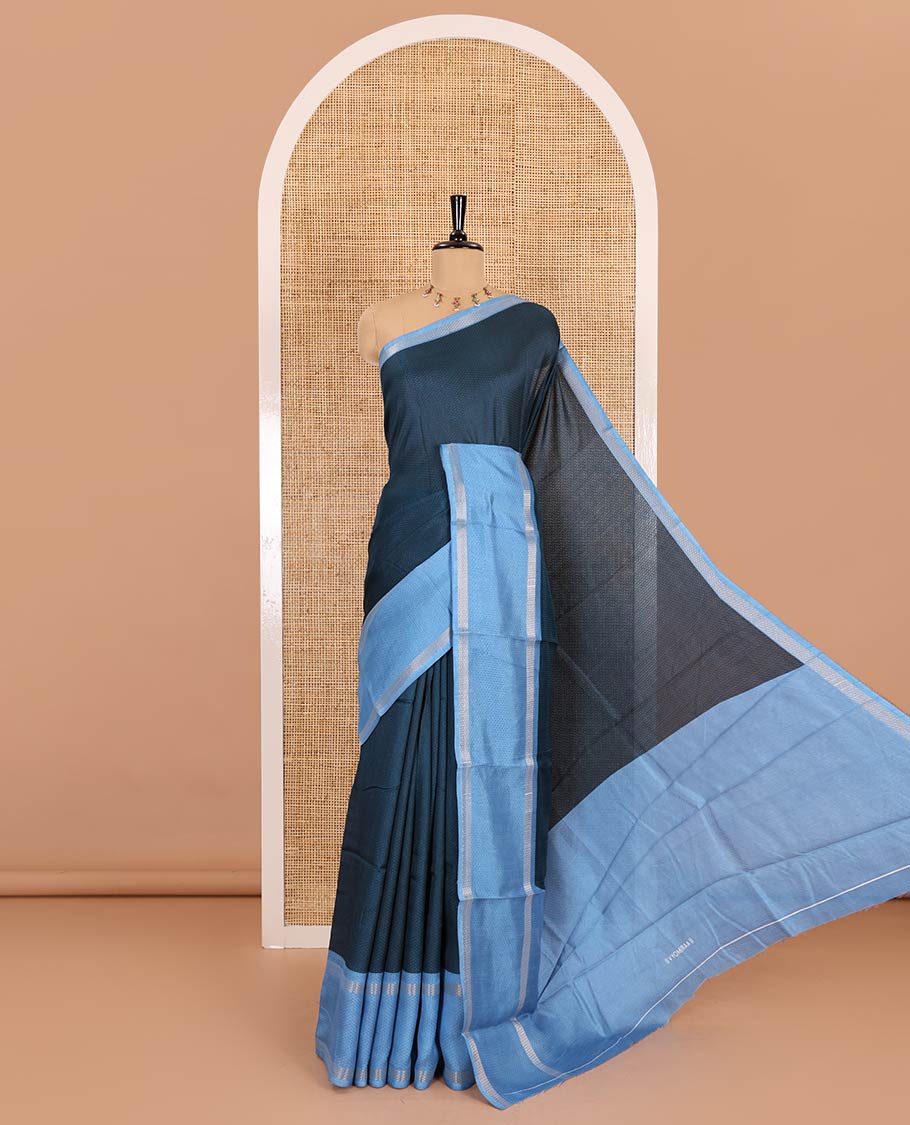 Blue embossed moss chiffon saree, contrast traditional rettai pettu border, embossed pallu, and a contrast embossed blouse