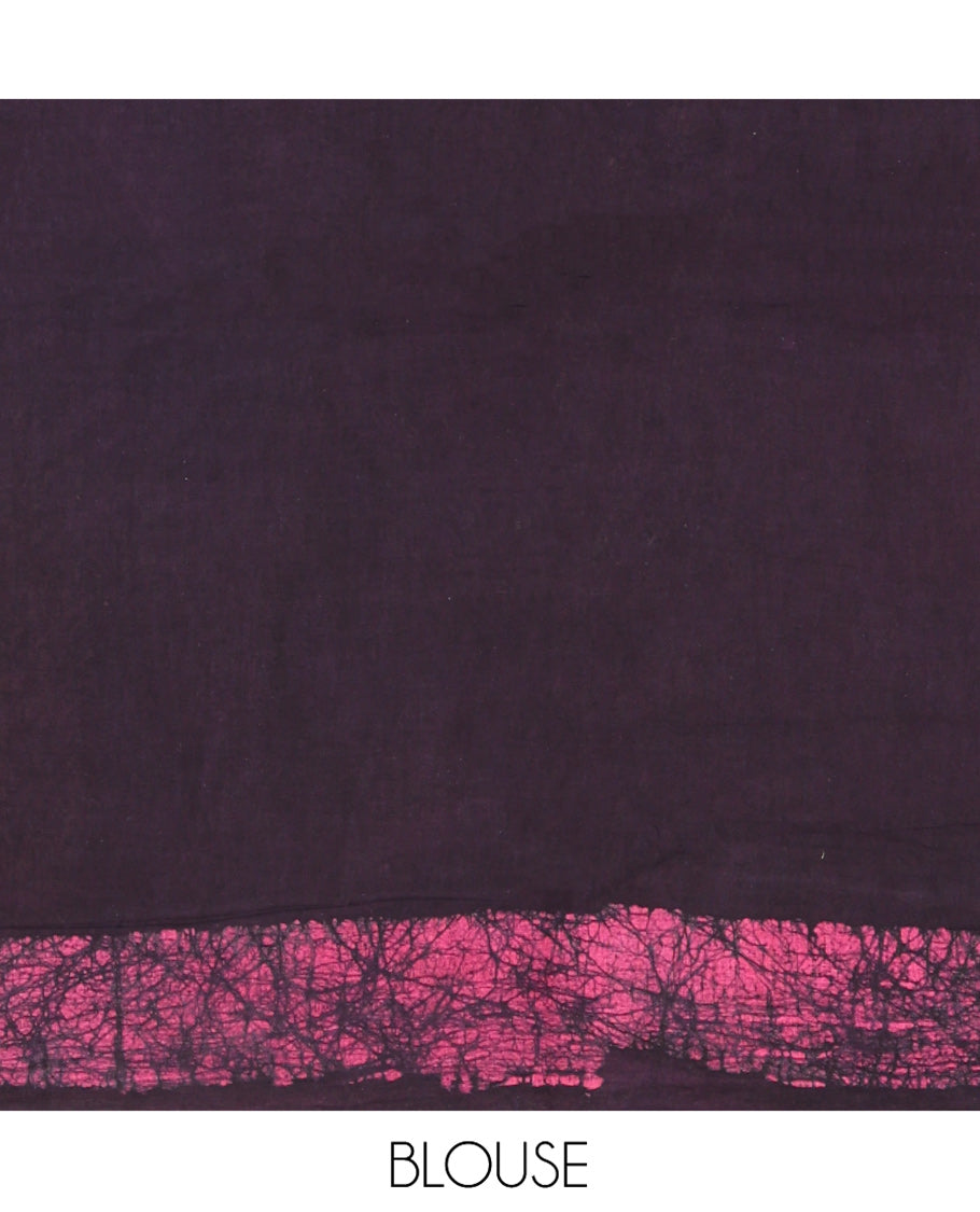 Wine Mul Cotton Saree Detailed with Batik-Style Floral Motifs Printed All Over Its Body, Complemented by a Contrast Batik Printed Border, Pallu Mirrors the Same Batik Print, and Is Paired with a Matching Blouse