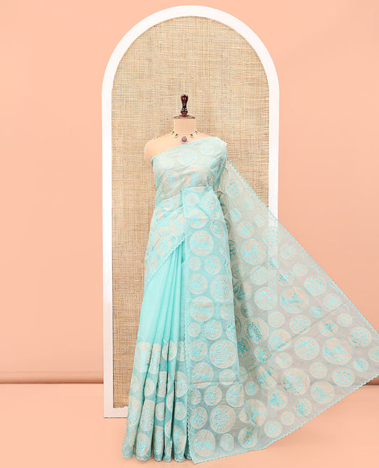 Sea Green Organza Saree, Delicately Woven with Floral Enclosed Circle Motifs Thread Embroidery, Subtle Scallop Border, Delicately Embroidered Pallu, and Paired with a Matching Embroidered Blouse