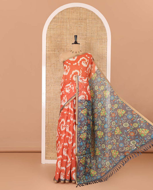 Borderless Orange shibori printed linen cotton saree, contrast kaleidoscope colored kalamkari floral vine print, and a contrast printed blouse