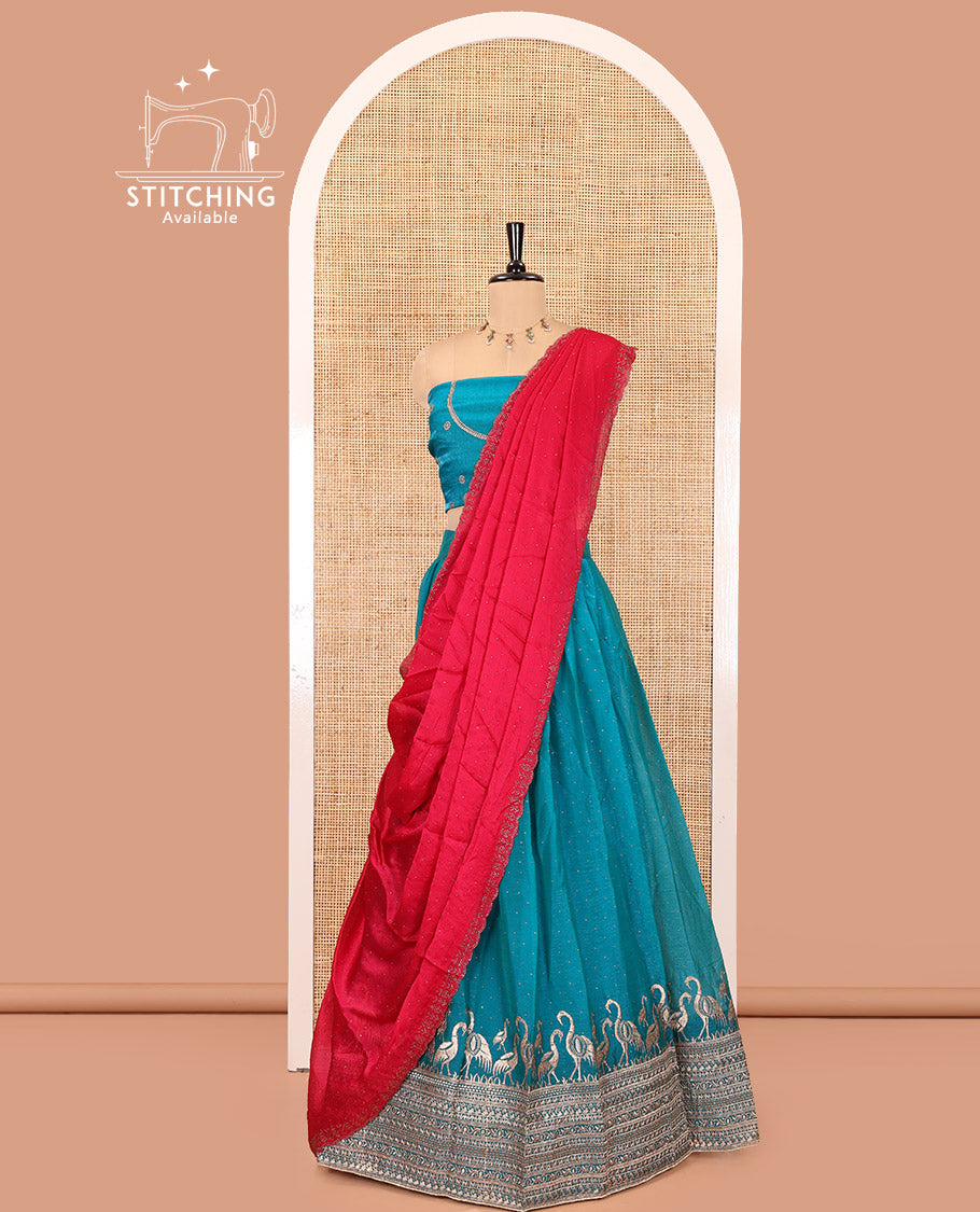 Rama Green Half-Saree Set, Gracefully Embellished with Stone Work and Bird Motifs Embroidery on Its Satin Georgette Skirt, Highlighted by Embroidered Border, Paired with a Matching Blouse, and Comes with a Contrast Scallop Stone Work Dupatta