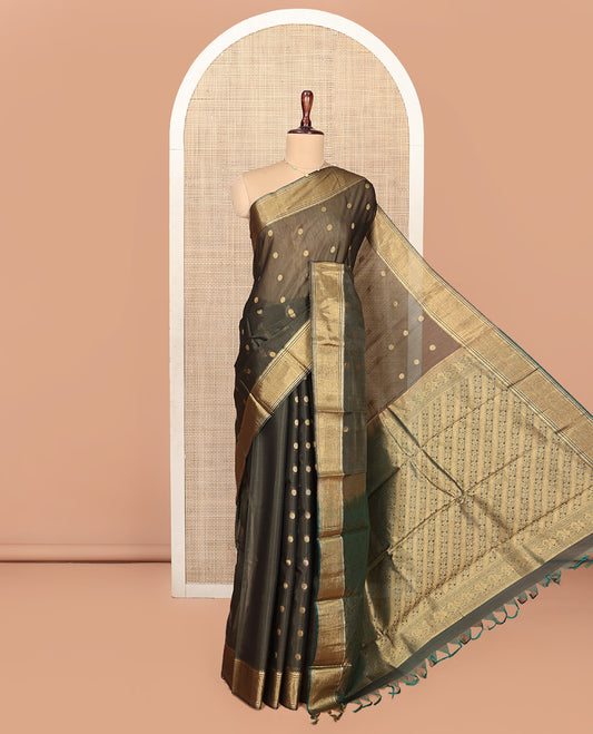 Green Silk Cotton Saree, Beautified with Zari Buttas All Over Its Body, Highlighted by Traditional Zari Border, Diagonally Woven Pallu and Paired With a Matching Blouse