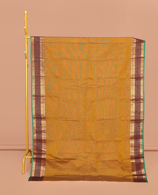 Mustard Plain Chettinad Cotton Saree, Complemented by Contrast Traditional Zari Border, Pallu of Stripes, and Paired with a Matching Blouse