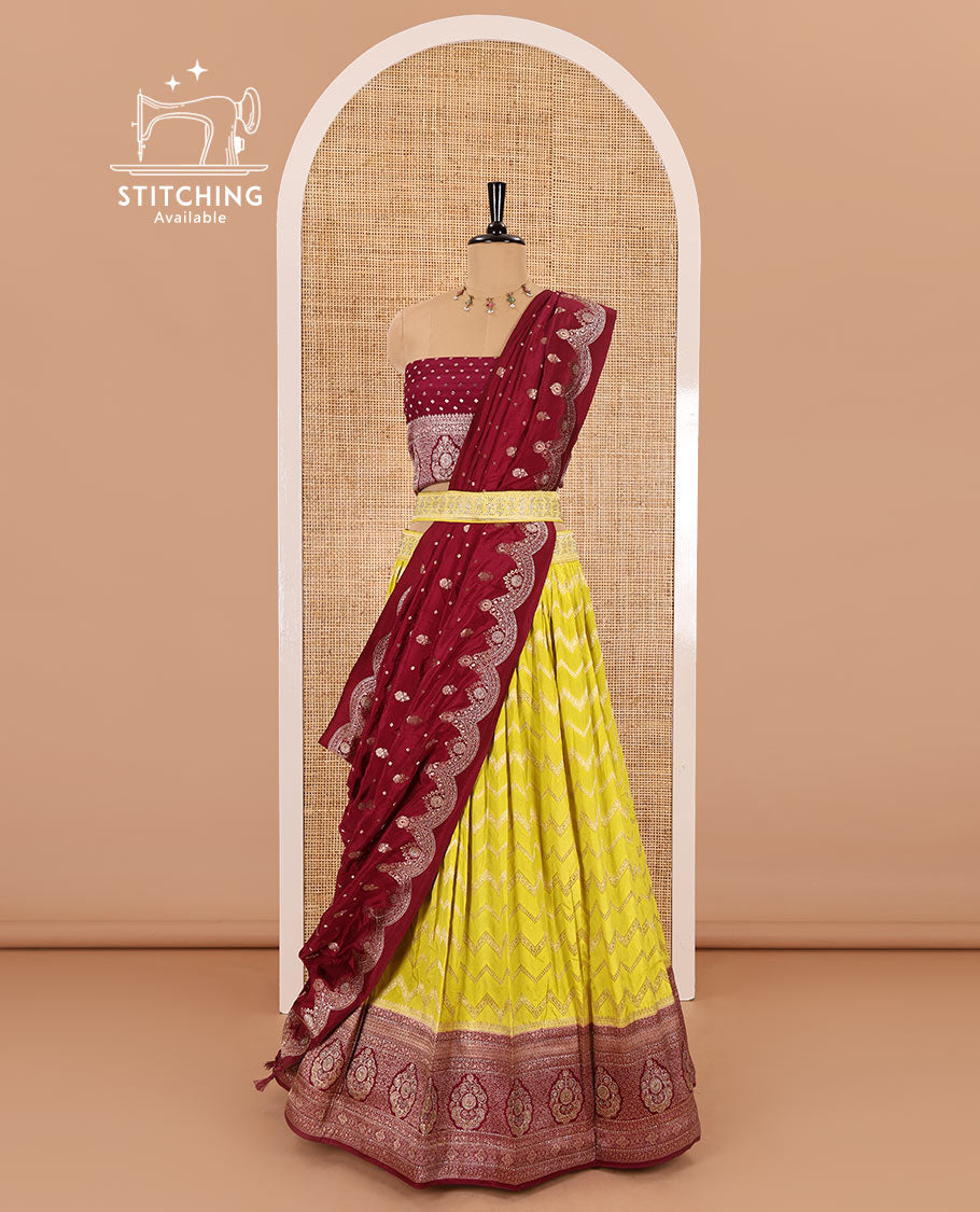 Liril green chiniya crepe half-saree, chevron zari jacquard with contrast intricate patterned stone work bordered skirt, contrast blouse, and a scallop bordered intricate dhavani
