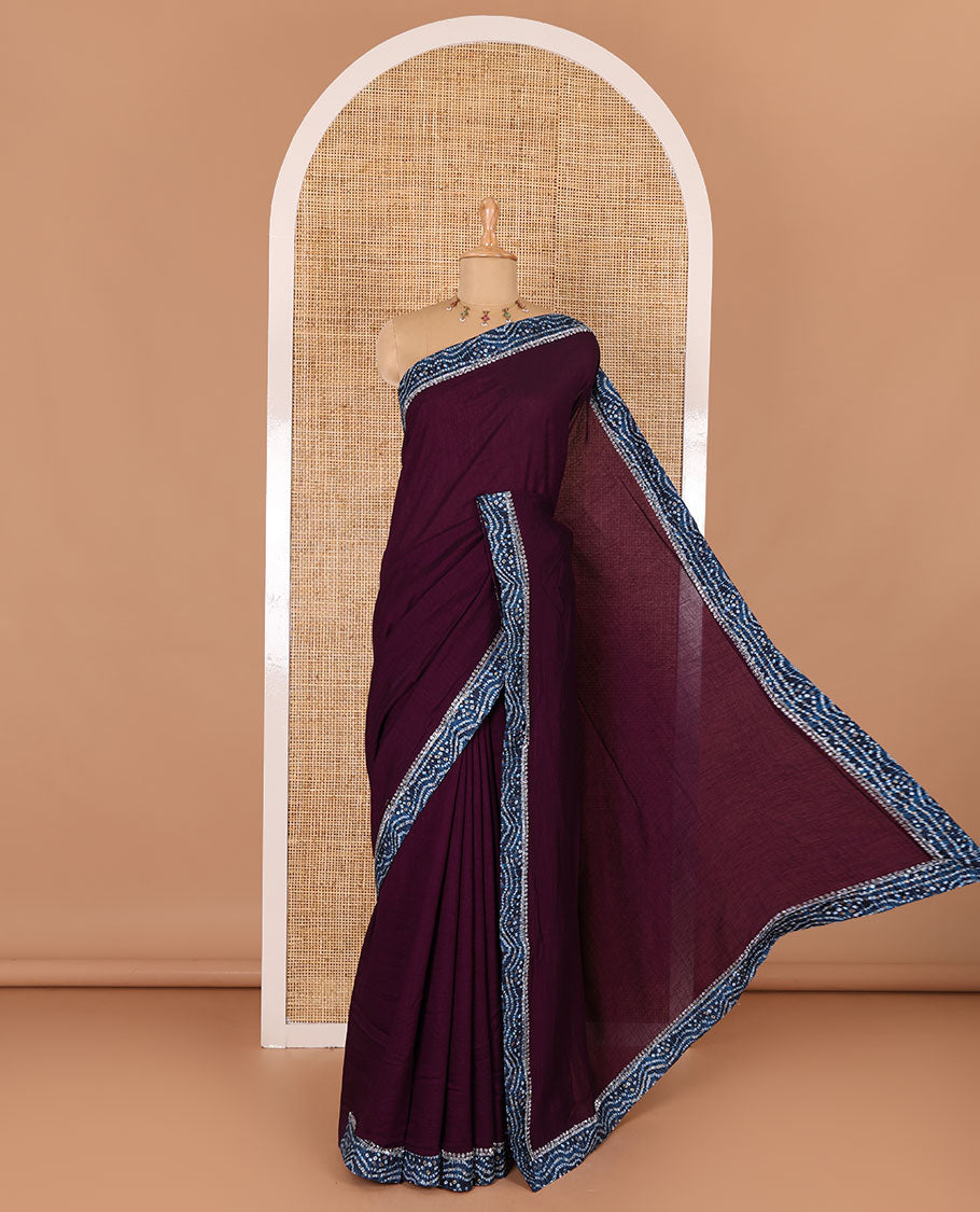 Wine plain Vichitra silk saree, contrast bandhani printed with Swarovski micro-stonework border, and a contrast bandhani printed blouse