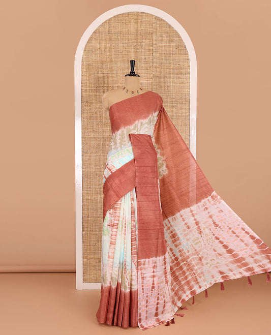 Multi color shibori printed jute tussar saree, contrast plain border, plain pallu with tussels, and contrast plain blouse