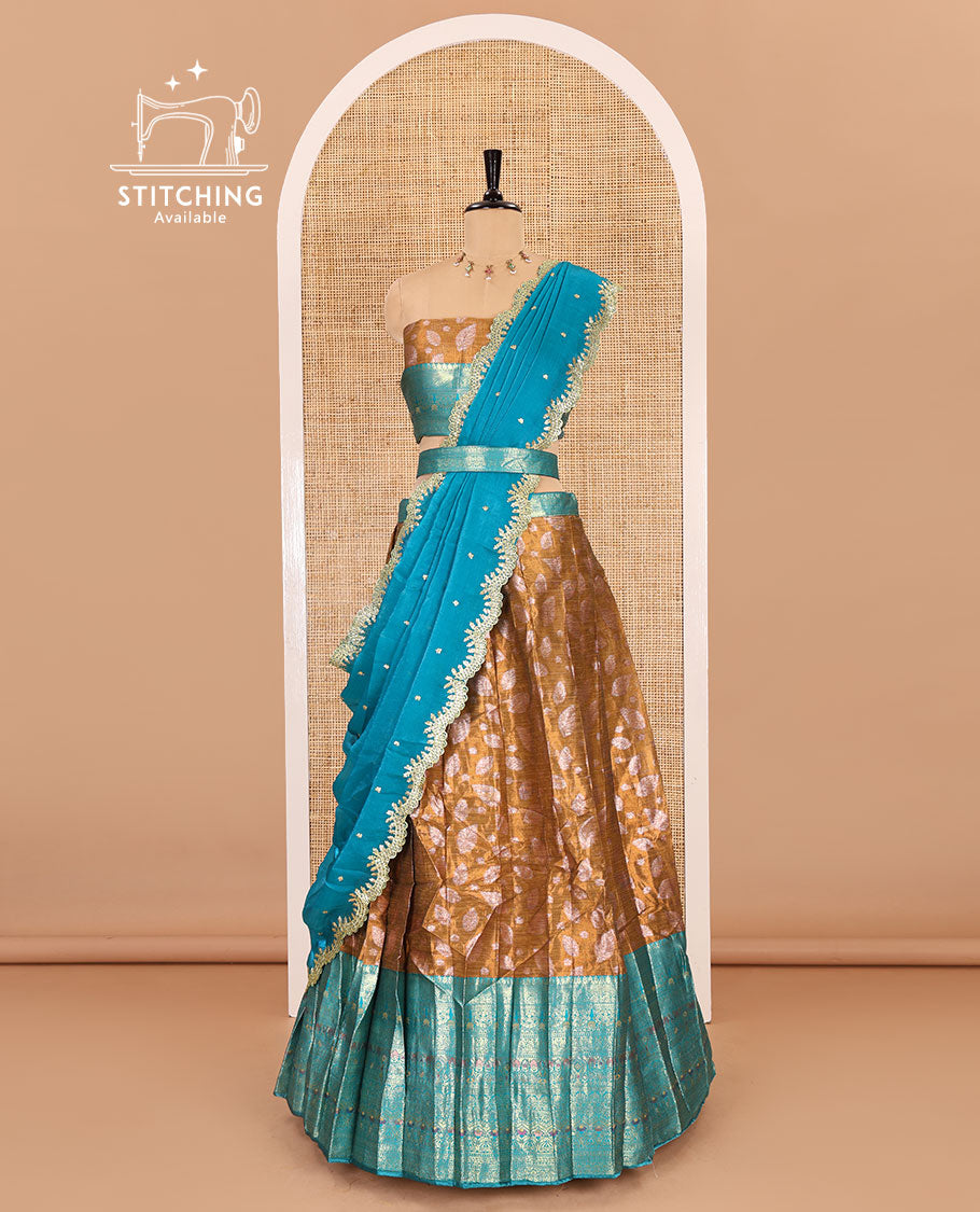 Mustard and rama color half-saree, leaf jacquard with contrast traditional bordered banarasi tissue skirt, a matching blouse, and a contrast scallop embroidered fendi organza dhavani