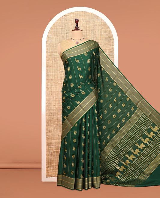 Green Mysore Silk Saree, Artfully Woven with Peacock-Deer Zari Buttas, Complemented by a Zari Geometric Border, a Grand Pallu, and a Matching Blouse