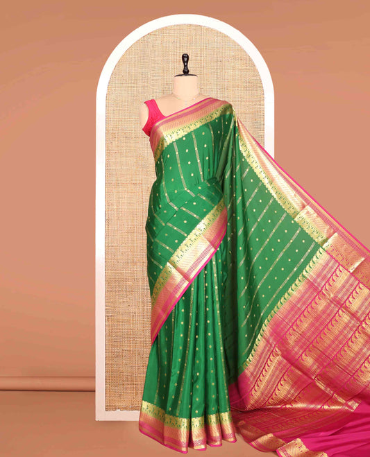 Green Mysore Silk Saree, Artfully Detailed with Zari Buttas and Stripes, a Contrast Traditional Zari Border, Intricately Designed Pallu, and a Contrast Blouse