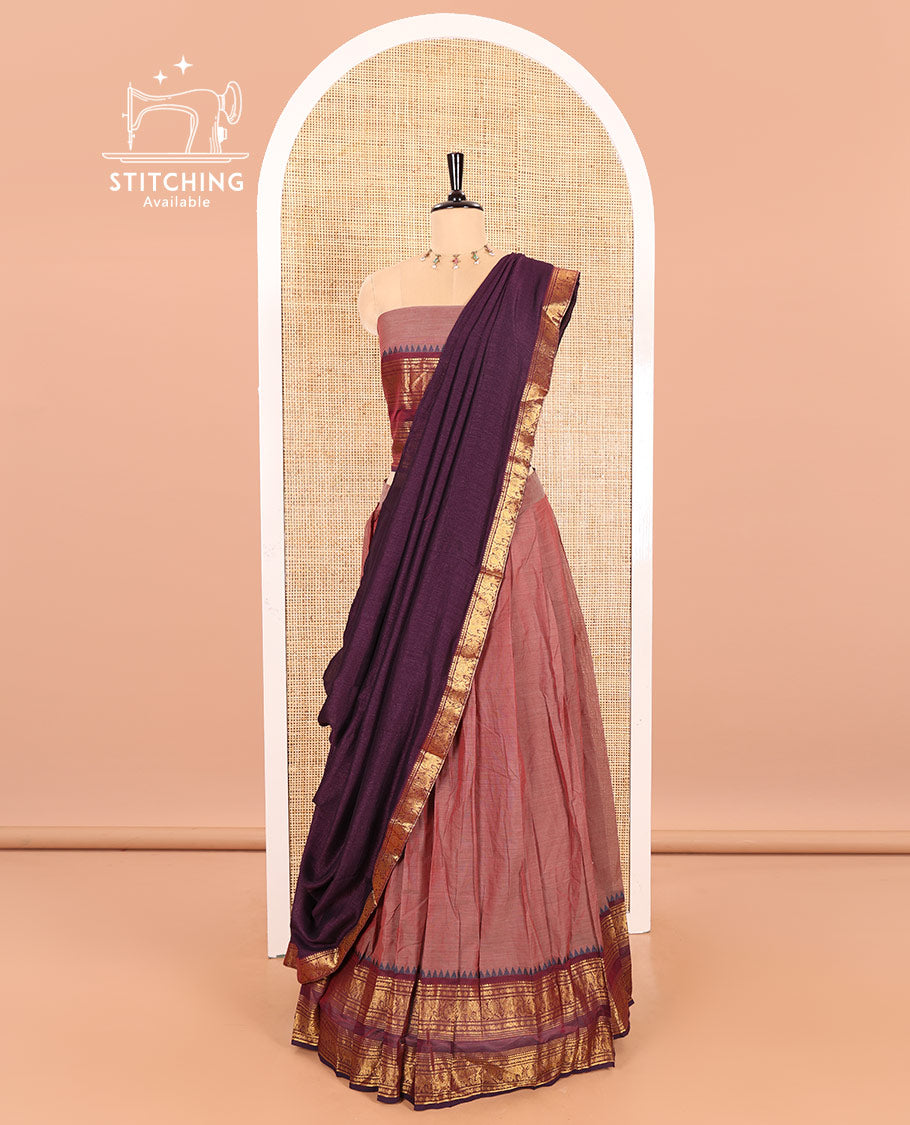 Dark Onion Pink-Wine Chettinad Cotton Half-Saree Featuring a Plain Skirt, Highlighted with a Contrast Peacock-Elephant Motifs Woven Rettai Pettu Zari Border, a Subtly Woven Matching Blouse, and a Vichitra Silk Contrast Traditional Zari-Bordered Dhavani