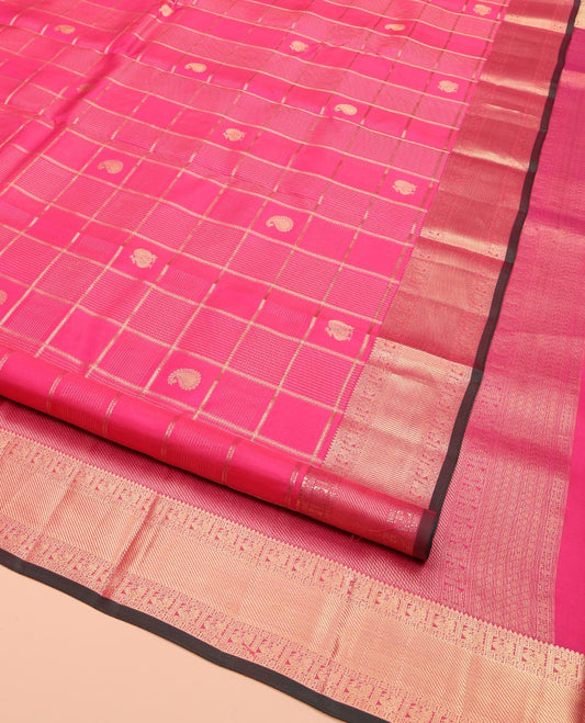 Pink Kanchipuram Silk Saree, Enriched with Manga Buttas, Mayil Buttas, and Micro-Checked Design on Its Body, Highlighted by a Zari Border of Rekku, Diamond, Star Vanki, and Mayil Designs, Grand Pallu of Diagonal Stripes, and Paired with a Contrast Blouse