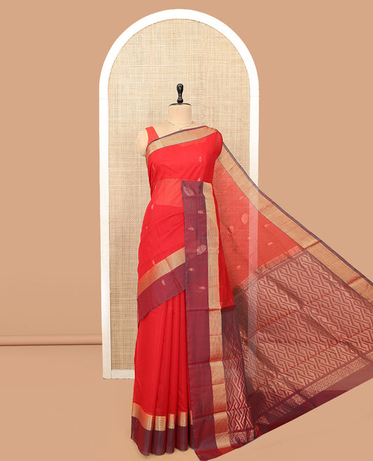 Red Silk Cotton Saree, Woven with Zari Buttas, a Contrast Zari Buttas Border, Intricate Pallu, and a Contrast Blouse