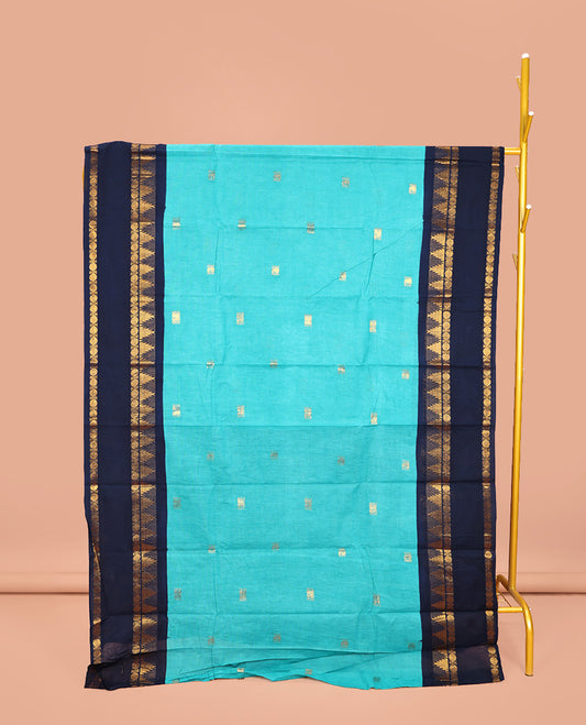 Blue Sungudi Cotton Saree, Elevated with Zari Buttas on Its Body, Complemented by a Contrast Retttai Pettu Traditional Zari Design Border, Zari-Striped Pallu, and Paired with a Contrast Blouse