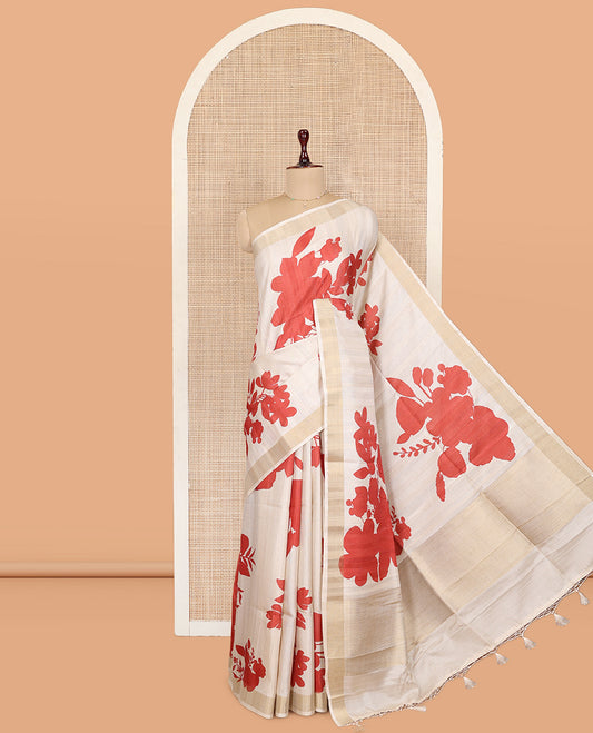 Cream Tussar Silk Saree, Adorned with Floral Silhouette Print, a Zari Border, and a Contrast Printed Blouse