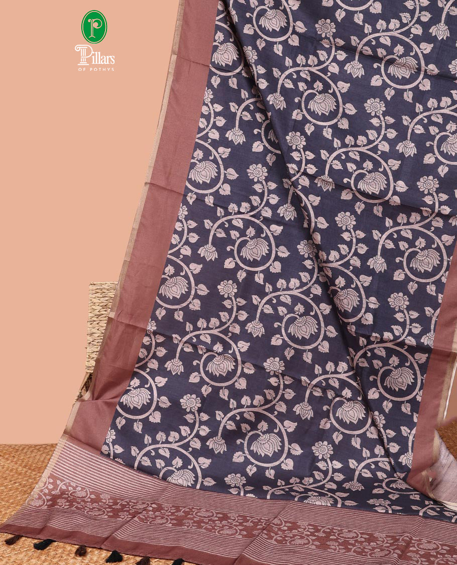 Grey kalamkari printed semi tussar saree with gold zari piping border & printed pallu with tussels along with plain blouse