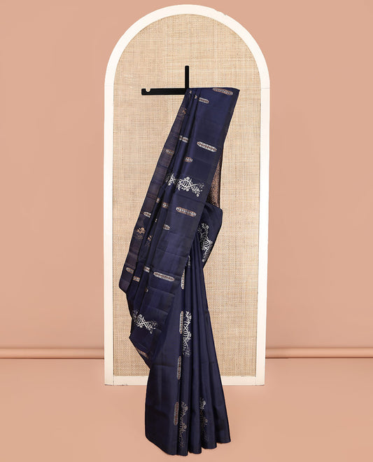 Borderless Blue Mayuri Soft Silk Saree, Gleamed Up with Zari Buttas, Highlighted by Pallu of Intricate Designs, and a Matching Blouse