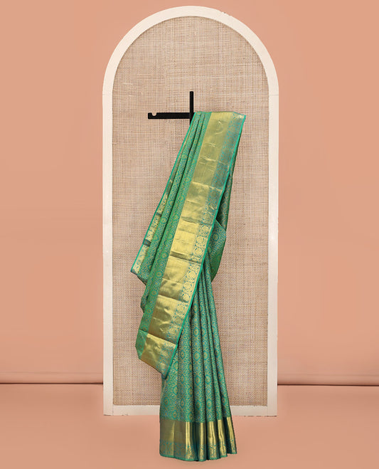 Green Kanchipuram Wedding Silk Saree, Enriched with Floral Jacquard Design On Its Body, Highlighted by Zari Border of Kodi Visiry Designs, Grand Pallu and Paired with a Matching Blouse
