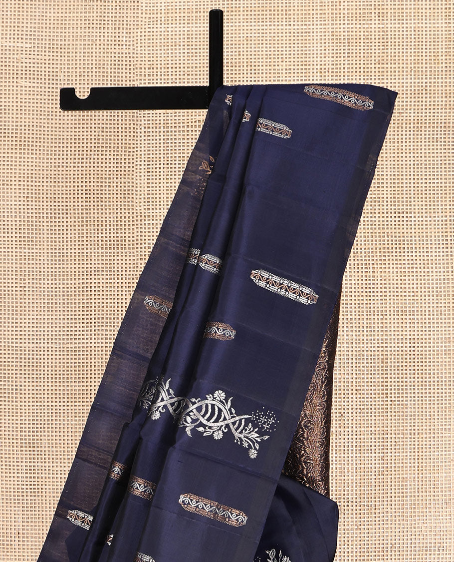 Borderless Blue Mayuri Soft Silk Saree, Gleamed Up with Zari Buttas, Highlighted by Pallu of Intricate Designs, and a Matching Blouse