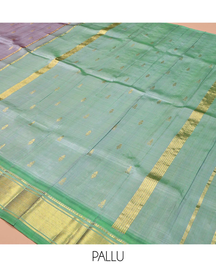 Grey Kanchipuram Silk Saree,  Detailed with Zari Buttas, a Contrast One-Sided Border of Rekku, Banaras, and Jaal Designs, Zari Design Pallu, and No Blouse