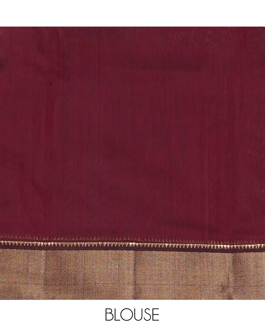 Maroon Maheshwari Cotton Saree, Adorned with Buttas, Highlighted by a Traditional Zari Border, Pallu Gleamed Up with Zari Buttas, and a Matching Blouse