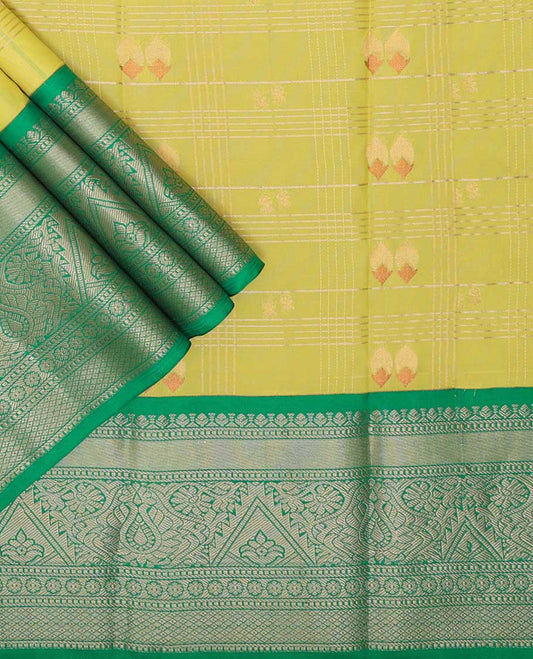 Lemon yellow checked, floral design art silk pavadai material with contrast zari design border & zari design blouse