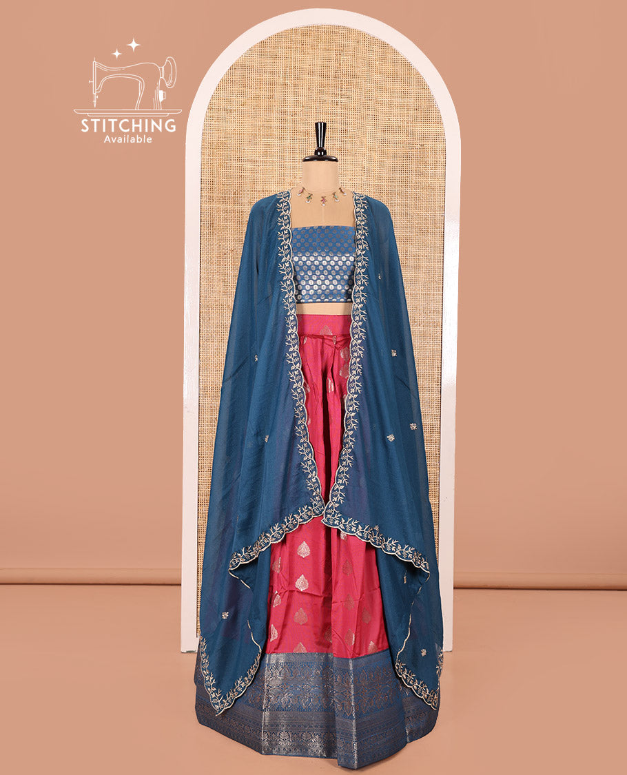 Peacock Blue and Rani Pink Semi-Banaras Silk Half-Saree Featuring Zari  Buttas All Over the Skirt, Highlighted with a Contrast Traditional Zari Design Border, Rudraksham Motifs Woven Blouse, and a Shimmer Georgette Scallop-Embroidered Dhavani