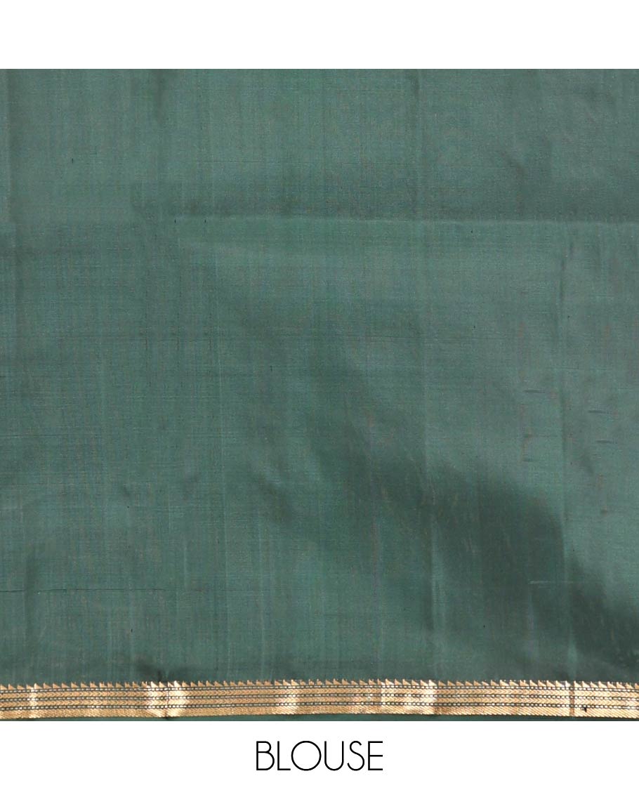 Green Mayuri Soft Silk Saree, Beautifully Bedecked with Zari Buttas All Over Its Body, Complemented by Contrast Border of Ara Bogudi, Muthu, Banaras, and Kathir Designs, Pallu of Neli, Muthu, and Banaras Designs, and Paired with Contrast Blouse