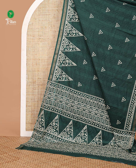 Green batik-style triangle motifs printed dola silk saree, batik temple motif printed piping zari border & batik geometric printed pallu