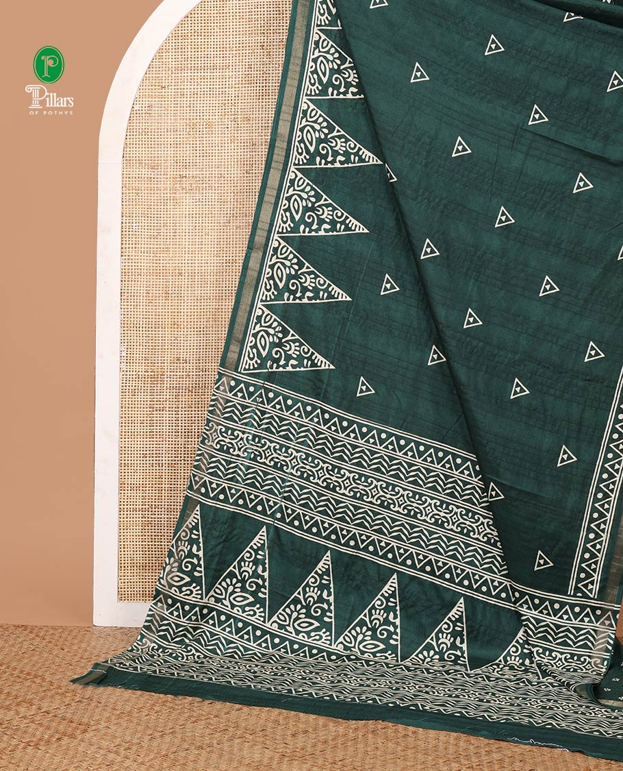 Green batik-style triangle motifs printed dola silk saree, batik temple motif printed piping zari border & batik geometric printed pallu