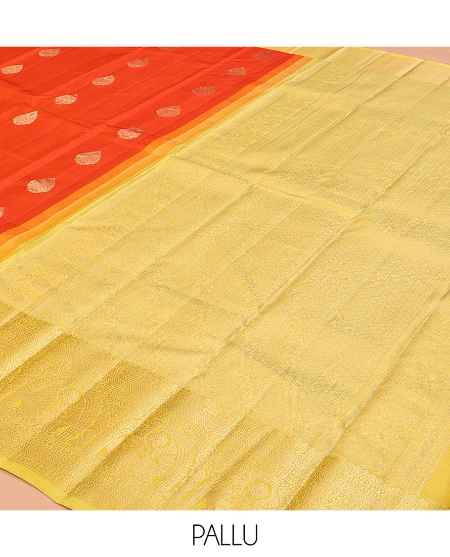 Orange Zari Buttas Vasundhara Silk Saree, Complemented by a Contrast Traditional Border of Mayil Designs, Sparsely Threaded Pallu, and a Contrast Blouse