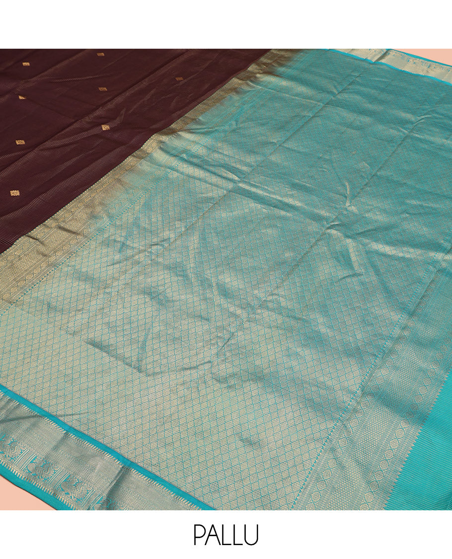 Brown Vasundhara Silk Saree, Charmingly Accented with Stripes and Zari Buttas All Over Its Body, Complemented by a Contrast Border of Rekku, Neli, Kuyil Kann, and Mayil Designs, Grand Jaal Pallu, and Paired with a Contrast Blouse