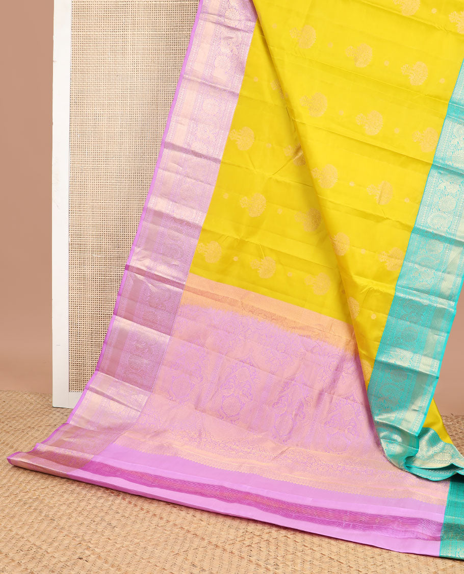 Yellow floral buttas silk saree with contrast ganga jamuna thilakam mokku, paun, kodi visiry, banaras design & zari design pallu