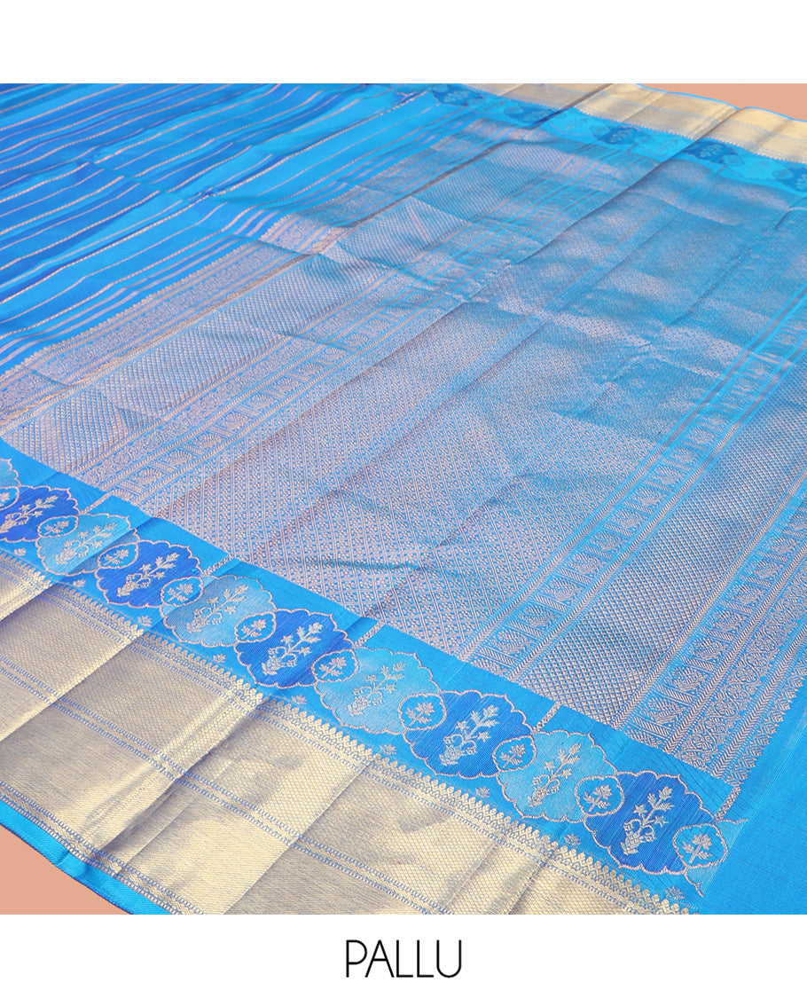 Blue Kanchipuram Designer Silk Saree, Gleamed Up with Zari Stripes, a Zari Border of Thilakam Mokku, Muthu, Rettai Neli, and Kuyil Kann Designs, Intricate Pallu, and a Matching Blouse