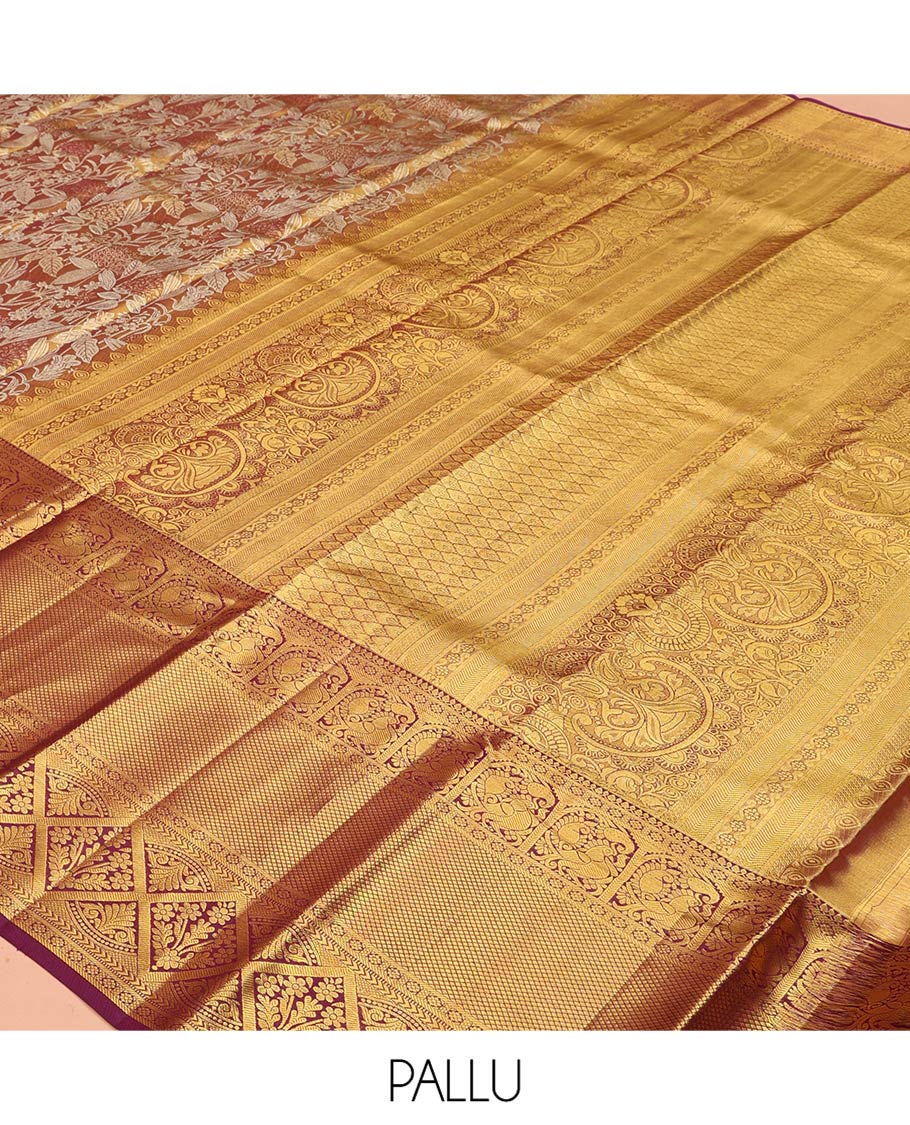 Gold Kanchipuram Tissue Silk Saree, Spotlighted with Jacquard Designs on Its Body, Complemented by a Contrast Border of Thilakam Mokku, Kamalam, Mayil, Mayil Kann, and Diamond Designs, Intricately Designed Pallu, and Paired with a Contrast Blouse