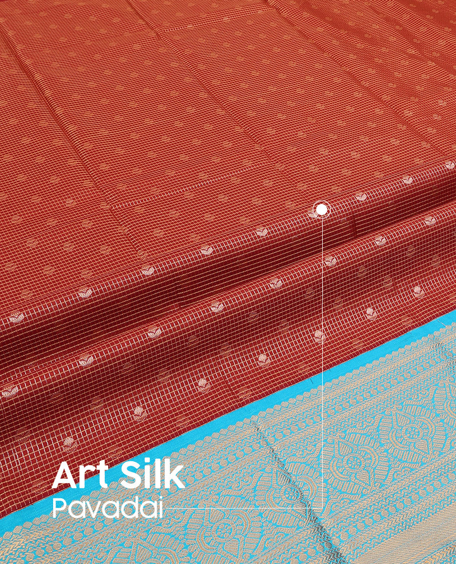 Maroon Art Silk Pavadai Material Set, Detailed with Zari Buttas and Zari Checks All Over Its Skirt, Highlighted with a Contrast Traditional Zari Design Border, and Paired with a Contrast Blouse